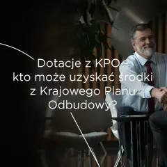 Dwóch mężczyzn w garniturach ściska sobie dłonie. Na pierwszym planie tekst: "Dotacje z KPO - kto może uzyskać środki z Krajowego Planu Odbudowy?".