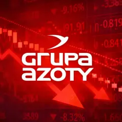 Wykresy giełdowe z czerwonymi spadkami i logo Grupy Azoty. Akcje Azoty na czerwonym tle.