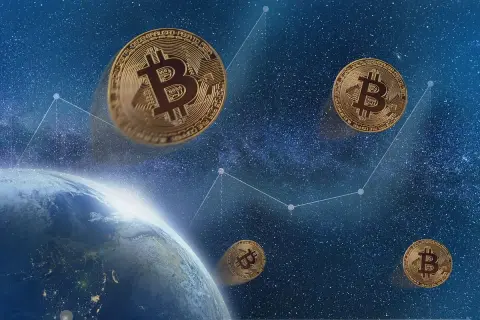Złote monety z symbolem B unoszą się nad Ziemią, symbolizując, czym są kryptowaluty i ich globalny zasięg.