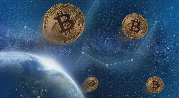 Złote monety z symbolem B unoszą się nad Ziemią, symbolizując, czym są kryptowaluty i ich globalny zasięg.