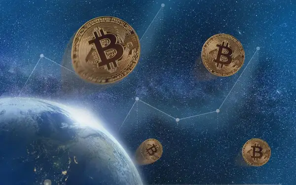 Złote monety z symbolem B unoszą się nad Ziemią, symbolizując, czym są kryptowaluty i ich globalny zasięg.
