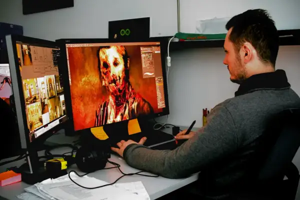 Grafik tworzy przerażającą postać zombie na ekranie, pracując nad nowymi **bloober akcje**.